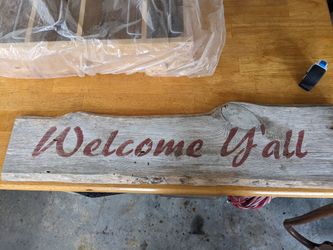 Wood "welcome y'all" sign