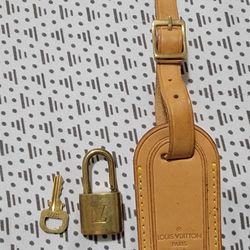 LOUIS VUITTON TAG AND LOCK