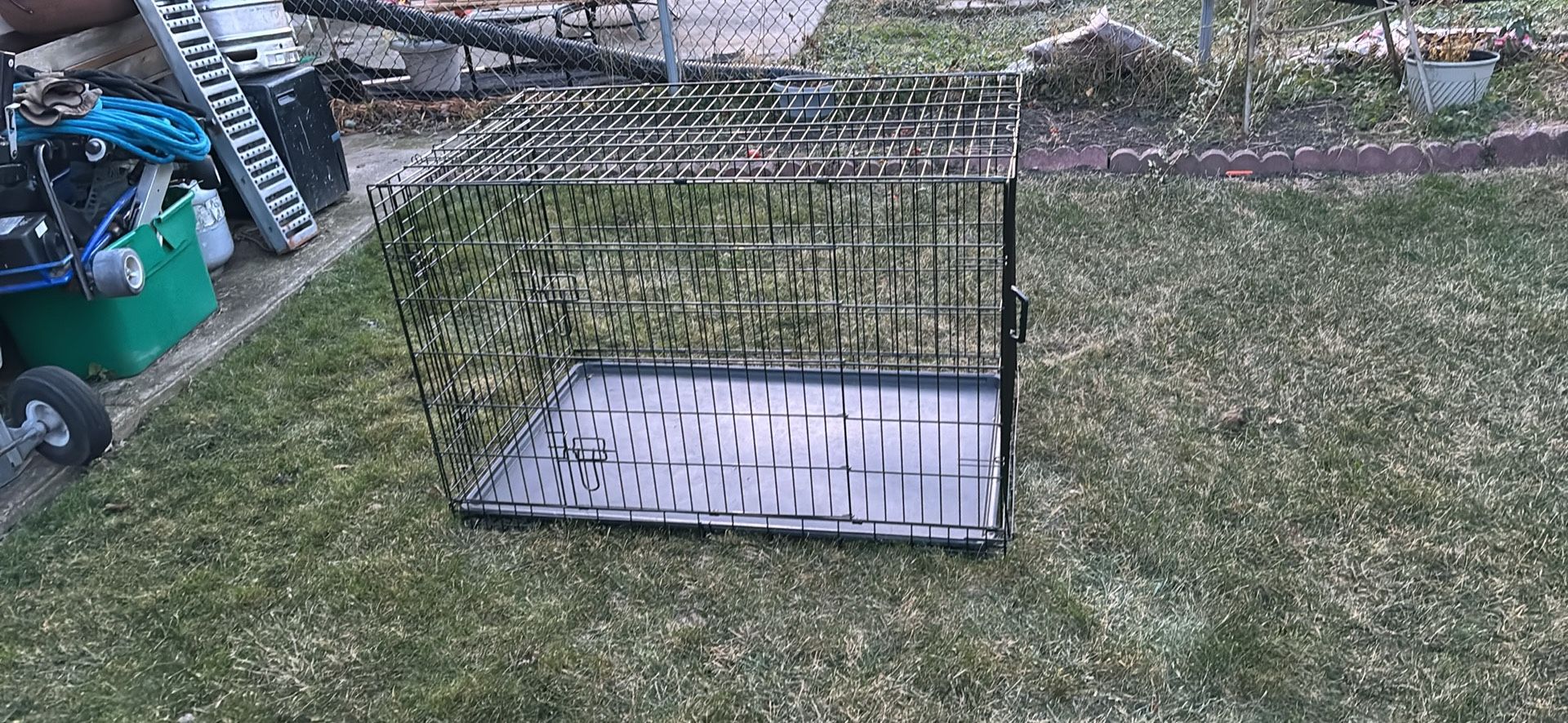 Use Dog Cage 48’ Long  29’ Wide 32 Hight 2 Doors 