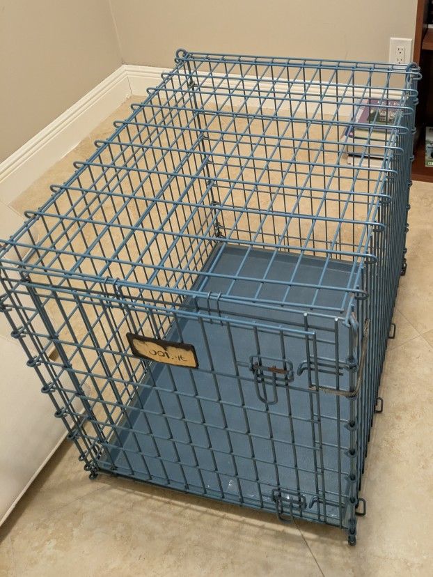 DOG CAGE FOLDS DOWN FOR TRANSPORT & STORAGE