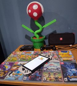 OLED Nintendo Switch bundle with 10 games and more