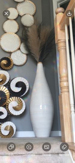 White vase with feathers