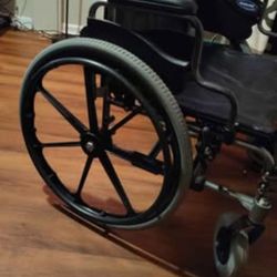 Invacare® Tracer® IV Wheelchair with Desk Arms and Urethane Tires.