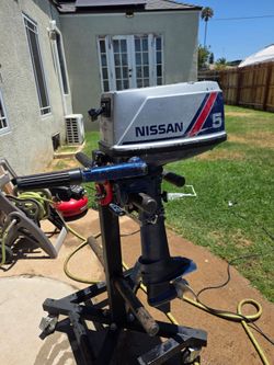 1990 Nissan 5hp 2 stroke outboard