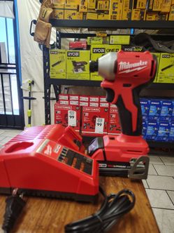 Milwaukee brushless hex impact with battery and charger