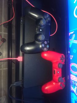 Sony PlayStation 4 Bundle with 2 Controllers and 1TB Toshiba External Hard Drive