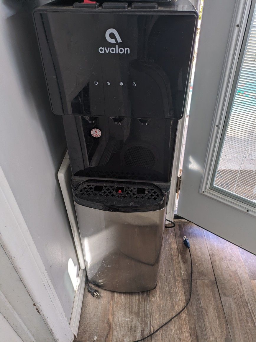 Avalon Water Cooler And Water Heater And 3, 5-Gallon Water Jugs