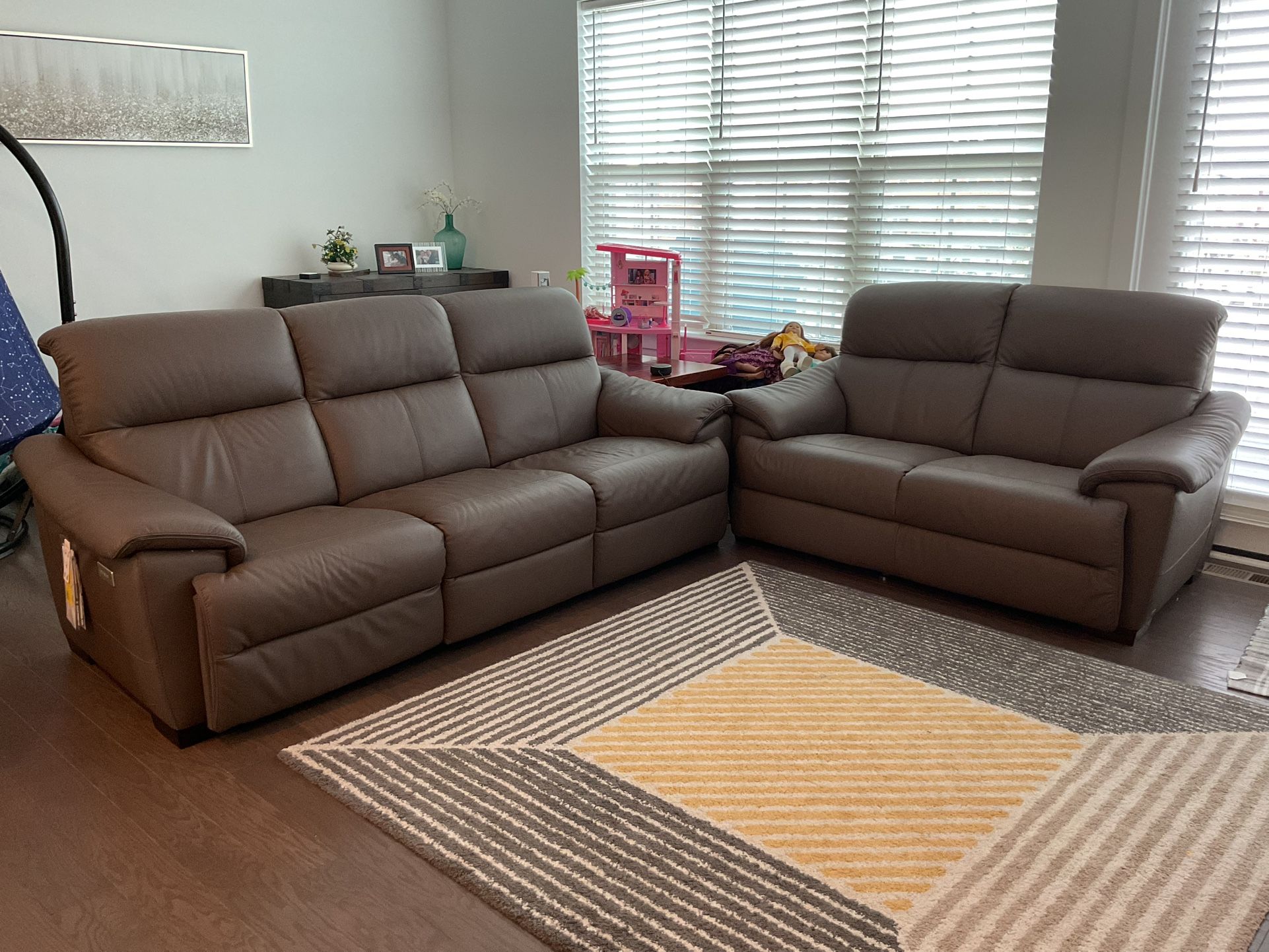 New - Natuzzi leather couch w/ power recliner and love seat set  **best offer, not free**