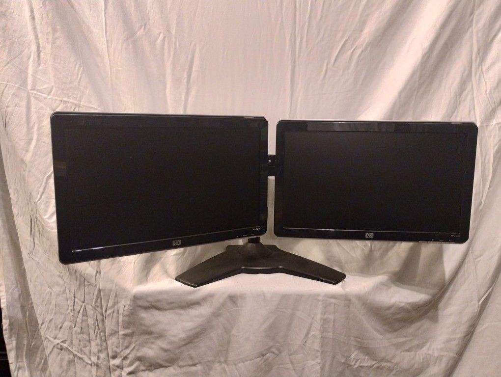 Hewitt Packard monitors (2) w/dual stand, like new, no scratches, work perfect w/power cords