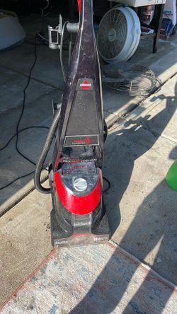Bissell carpet cleaner with built in attachment for upholstery