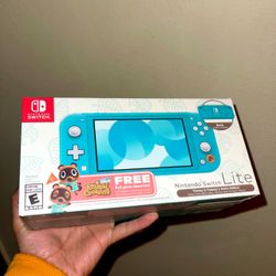 Brand new Nintendo Switch Lite Timmy & Tommy's Aloha Edition Teal System- Animal Crossing