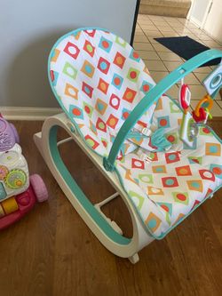 Baby bouncer and toy