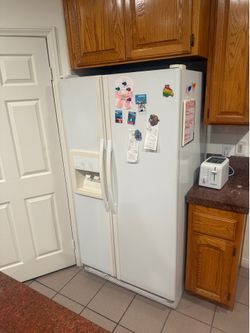 Whirlpool Side-by-Side Refrigerator  Refrigerator is working. Known issues:  * Water filter is difficult to replace (housing may need adjustment). * T