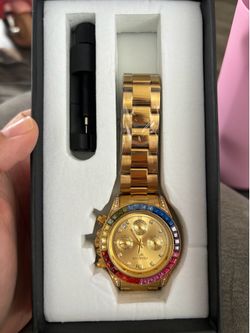 Gold watch, rainbow gems