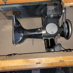 A singer table sewing machine