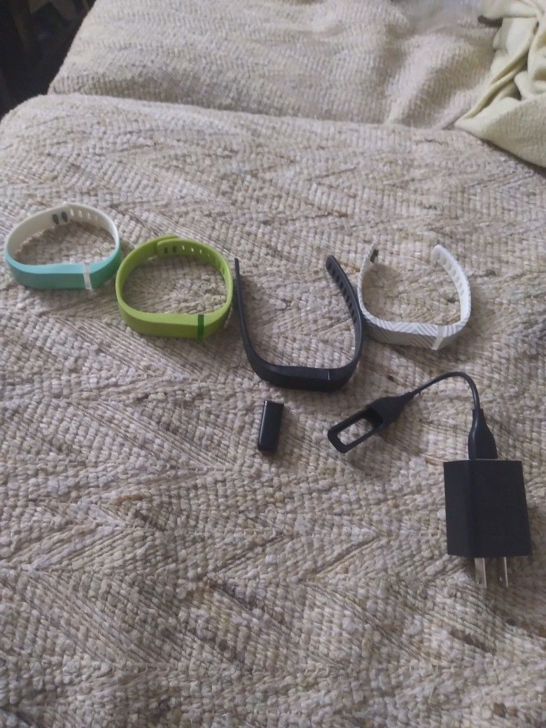 Fitbit With Extra Wristbands And Charger