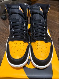 Air Jordan 1 Retro High OG, taxi/black-sail, men’s size 12.