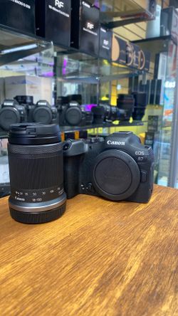 Canon R7 with 18-150mm.  Open box