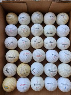 30 vintage golf balls