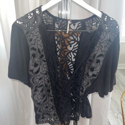 free people wrap around black blouse with lace detail size L