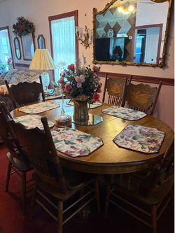 Oak oval table with 6 chairs and Hutch with glass doors