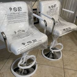 New adjustable swivel bar stools $85 Each