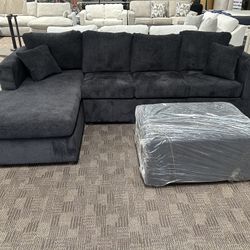 New Black Sectional And Ottoman