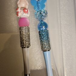 Handmade beaded ink pens. Add a touch of fun to writing with this beaded pen set. Featuring vibrant pink and blue colors, these pens are perfect for c