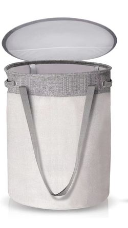 Hamper Full Of Sheet Comforter And Blankets 