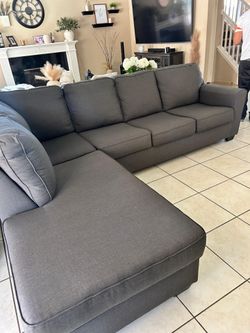 Beautiful charcoal grey sectional couch from Living Spaces LIKE NEW
