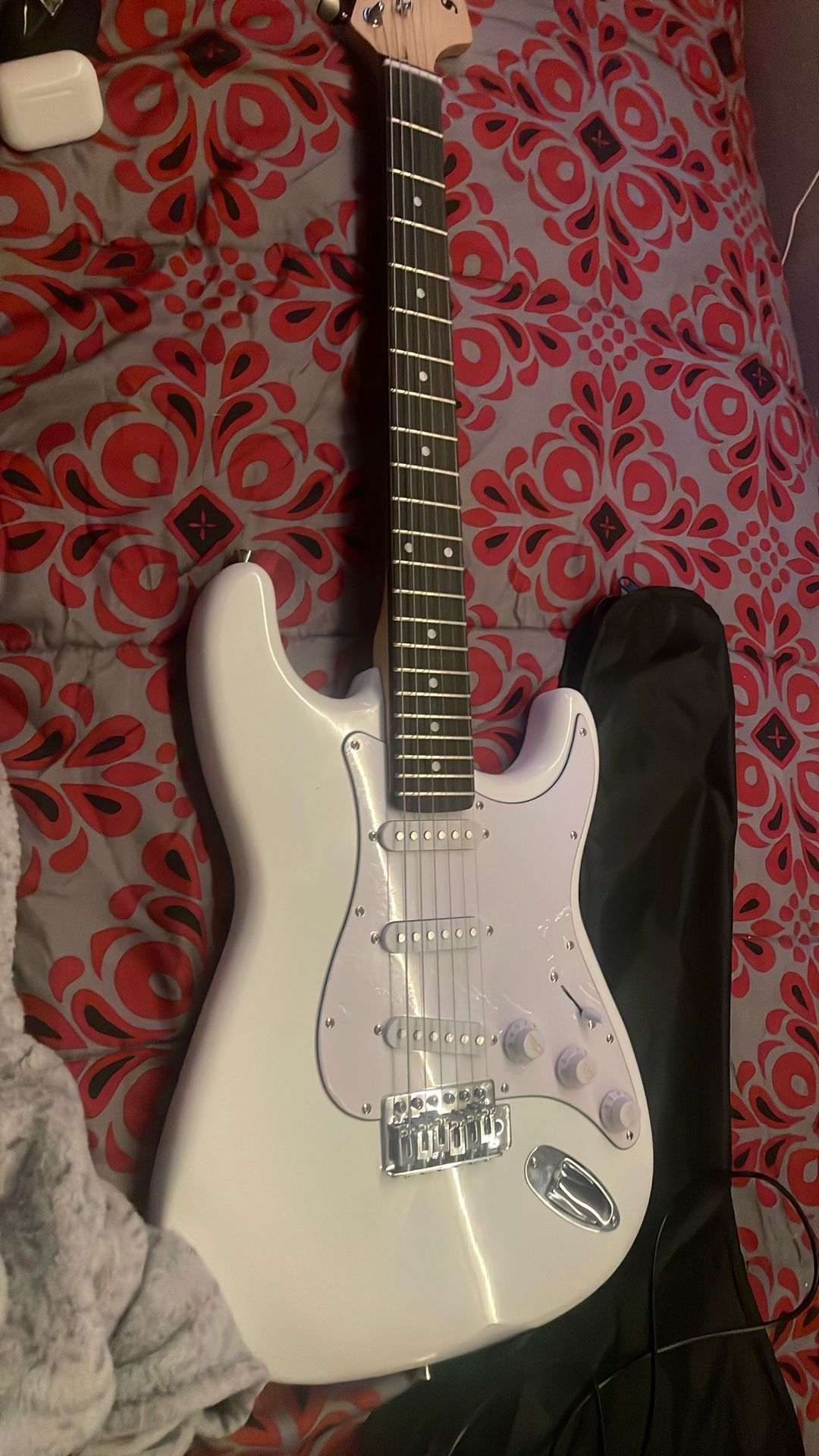 Electric Guitar And Comes With A pick And A Wammy Bar Tuner 