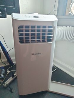 Used Portable air conditioner unit Henson w/ remote