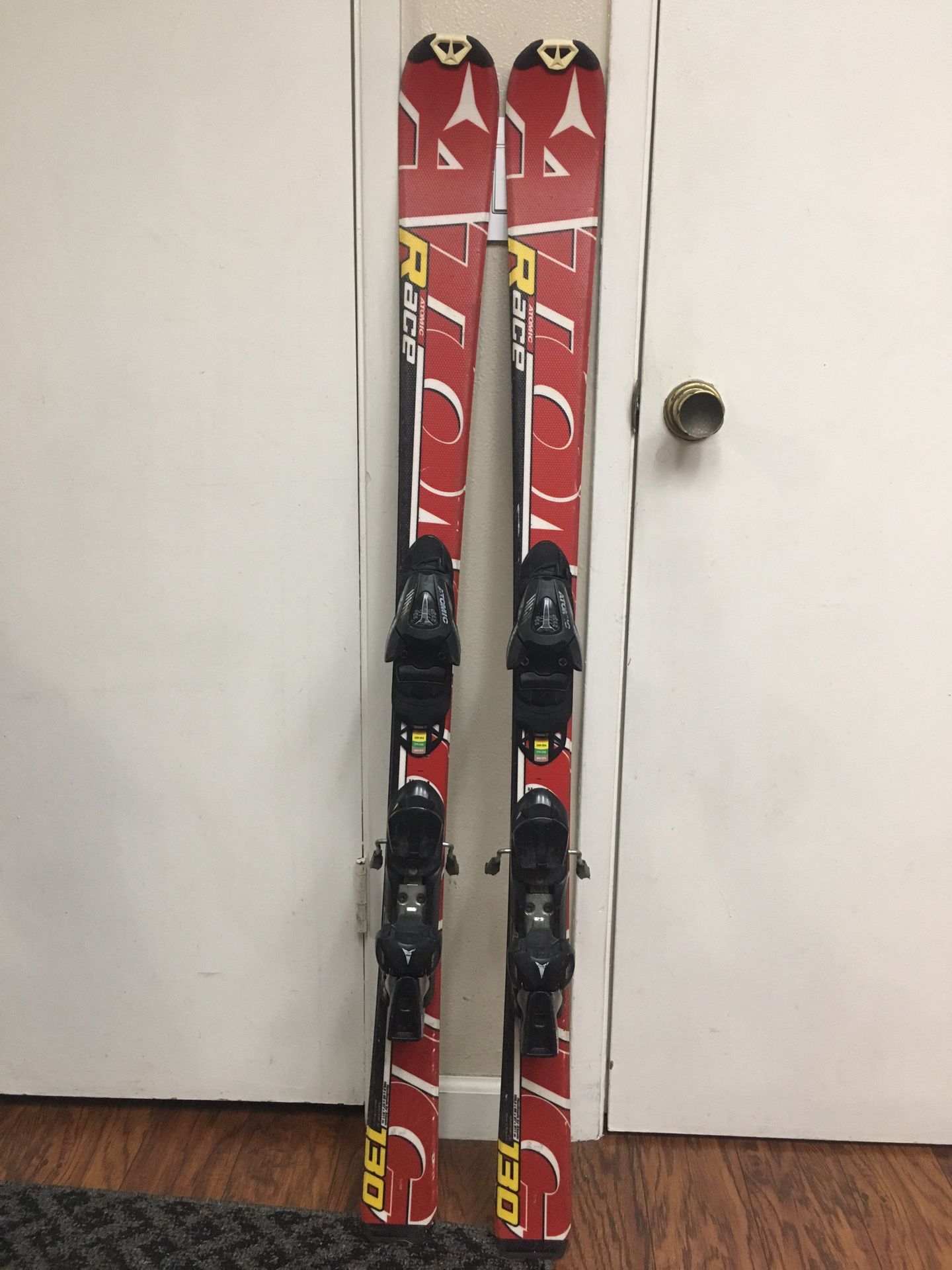 130cm atomic race skis with demo bindings fits most sizes of boots. Waxed and sharpened, ready to go