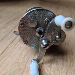 Antique fishing lures, reels 