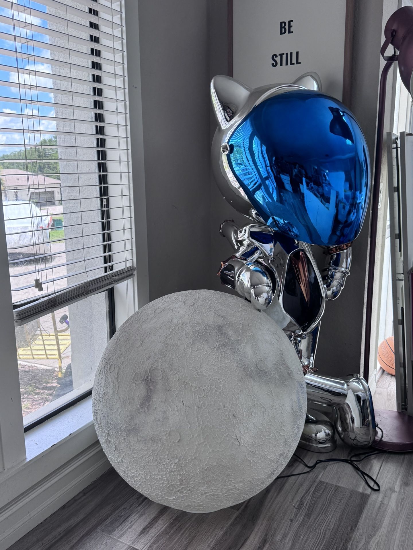 Cool Space Cat Leaning on Moon