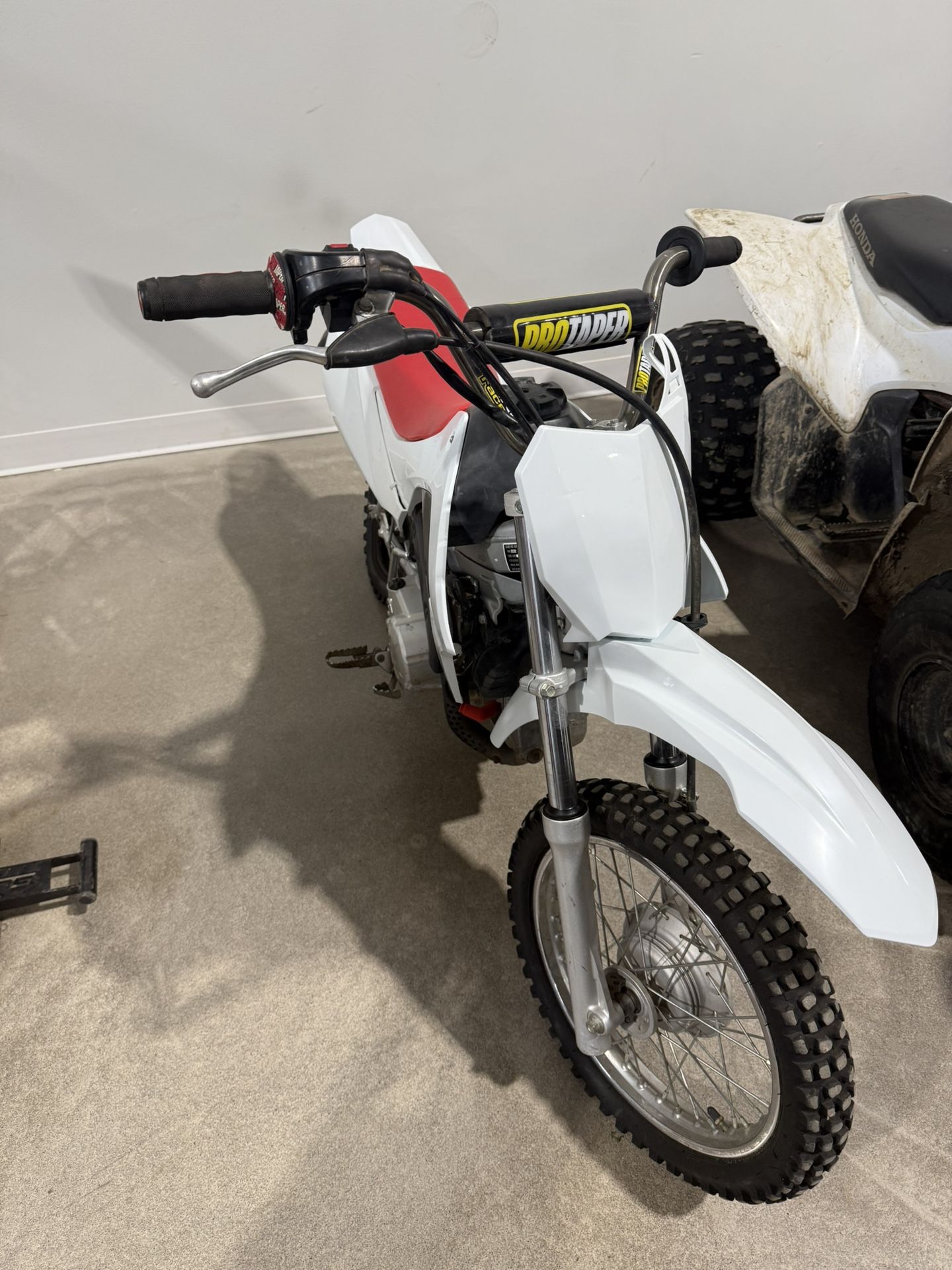 Honda 110 in great condition And It Has New Plastic’s And New Big Bars
