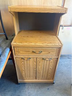 Dresser/ storage cabinet on wheels