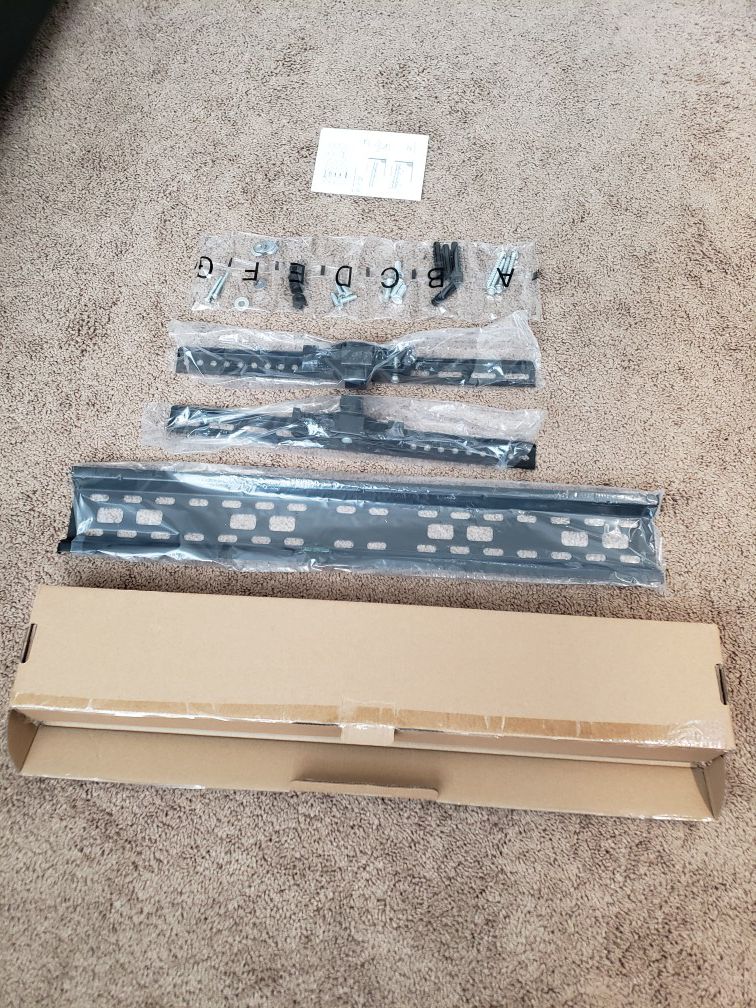 Tilt tv wall mount fits 23 to 70 inches..brand new .. holds over 75 pounds