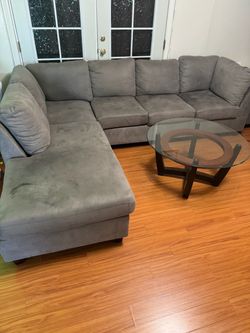 Gray Sectional Sofa Set + Glass Coffee Table + Ottoman