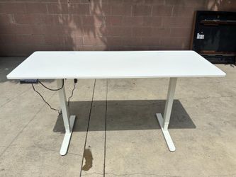 63" x 24" electric adjustable-height standing desk.  Height Range: 28.7" to 48"
