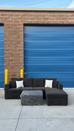 Dark grey Sectional couch with ottoman