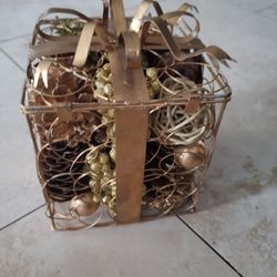 Gold Metal Christmas Present With Pinecombs Decor 