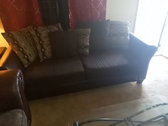 Nice couch dark brown comes with pillows