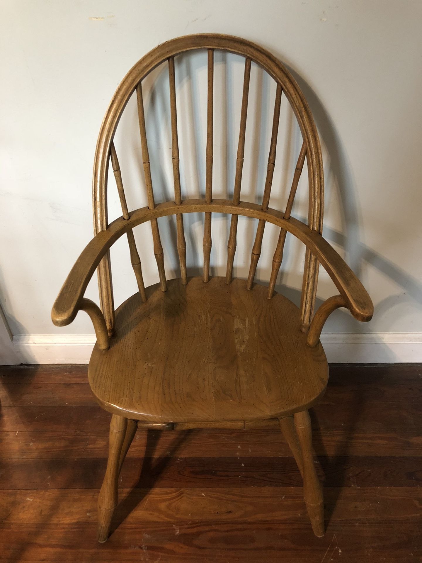 Wooden armed chair