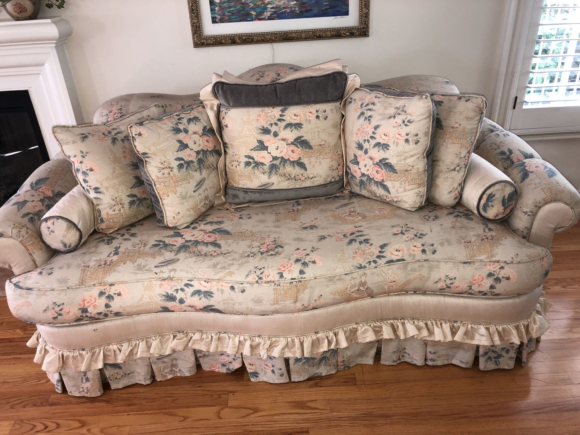 Beautiful linen pacer designer sofa upholstered, in a Asian print soft blues and pinks beige linen , reversible seats in soft green and pillows to ch