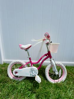 Selling a 14-inch kids’ bicycle with a basket.