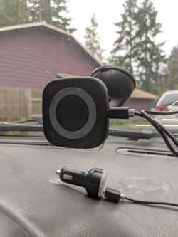 Wireless charging dashboard or windshield phone mount