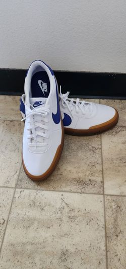 The shoe shown is the Nike Court Shot