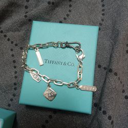 Tiffany And Company Silver Charmed Bracelet