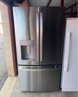 GE Stainless Steel Refrigerator And Freezer